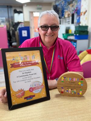 Charity founder Jo Haydon with two recent awards.