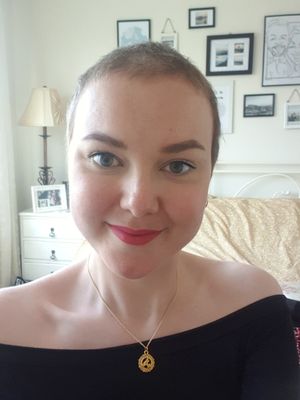 Abi Smith in 2020. A woman who lost her vision during a flight, and found herself unable to hold things, was diagnosed with a brain tumour.