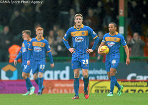 A dejected Asa Hall of Shrewsbury Town