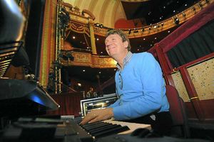 Pianist Allan Rogers in the music pit.
