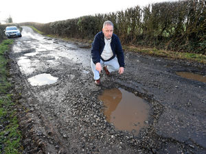 Supporting image for story: Potholed village road now 'impassable' as residents brand it 'worst in Shropshire'