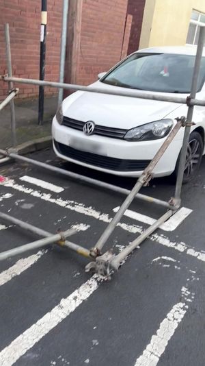This was the man's car parked up before the row erupted. The scaffolders had requested he moved it to another space. Photo: Kennedy News and Media