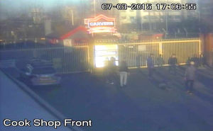 Yobs walk calmly away following the savage assault as Mr Cruwys lies motionless