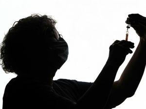 Supporting image for story: Believers in Covid conspiracies less likely to accept vaccine – study