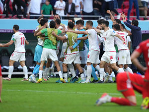 Supporting image for story: Politics overshadows Iran's win over Wales as fans clash