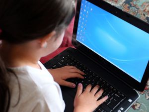 A child using a laptop