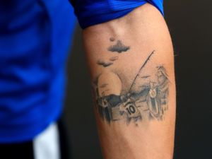 Supporting image for story: Topi Keskinen: The Finland star who sports a tattoo of Wayne Rooney fishing