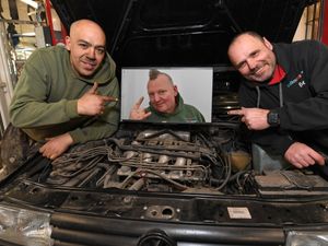 Lee Southern (centre) owner of Volksmagic garage, Oldbury, gets set to be on TV shows Car SOS and Wheeler Dealers, with colleagues Niahrome White and Steven Davis.