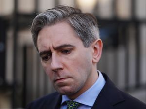 Supporting image for story: Woman in court charged with threatening Simon Harris