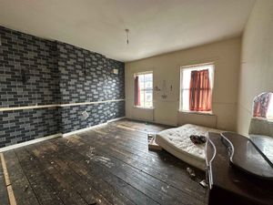 The bedroom requires work on the floor and needs bits for a bed