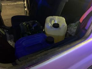 Supporting image for story: Two arrests and 75 litres of suspected stolen fuel seized by police