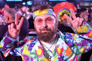 Sam Micklewright dressed up in a disco-themed outfit.