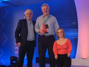 Supporting image for story: Swimming star Ellie Simmonds hands over award as Shropshire insurance firm wins top honour