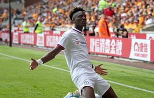 Tammy Abraham celebrates after scoring at Molineux