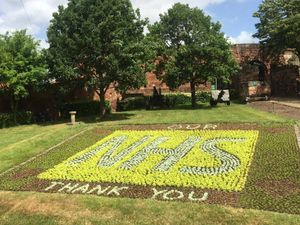 Supporting image for story: NHS thanked with flowerbed tribute at Shrewsbury Castle