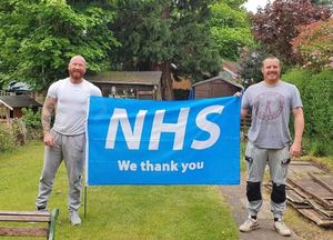 Kevin Davies and Scott Harris with the flag