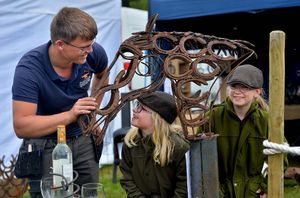 Felix Nelson, of Felix's Forge, and Millie and Poppy Devonport, 8