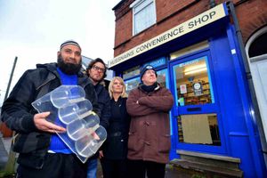 Mohammed Altaf from Hussnains Shop holding a sweet tray that youths ran off with, Matthew and Clare Burton from Extreme Hair Team and councillor Doug James