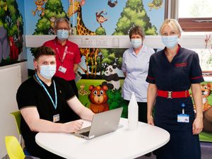 Supporting image for story: Jungle mural at hospital's vaccination clinic to put children at ease