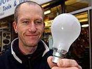 Supporting image for story: Stampede for light bulbs