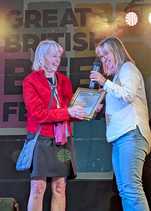 Monty’s Brewery co-founder Pam Honeyman (right) and head practical brewer Kate Thomas with the silver medal certificate and bottles of Mischief.