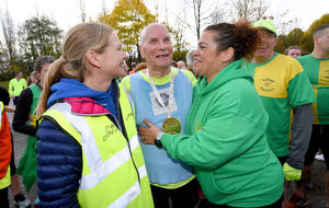Jim Hussey celebrates his 80th birthday during the Telford Park run