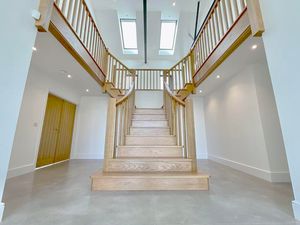 A cinema room is off the entrance hall. Photo: James Du Pavey