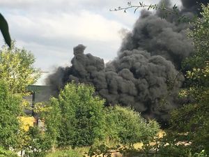 Supporting image for story: Trains cancelled as smoke billows from haulage blaze
