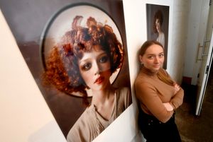 Photograph of Ukrainian photographer Lora Arkhypenko at Shrewsbury Museum and Art Gallery. 