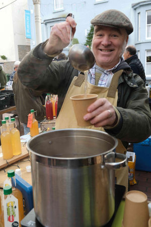 Simon Dockerty from appleteme based in Ludlow. They were at the festival with their apple, apple and pear, apple and ginger, apple and quince and apple and elderberry juices and hot mulled apple juice. Image by Andy Compton