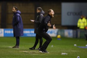 Shrewsbury Town boss Gavin Cowan celebrates at full-time