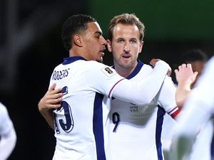 Supporting image for story: Harry Kane double leads England to World Cup with rout of Latvia