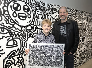Joe Whale (Doodle Boy) with British comic artist Charlie Adlard at the launch in Shrewsbury