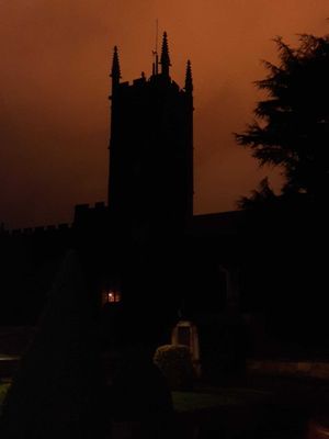 A dark orange colour can be seen over St Peter's Church. Photo: Martin Silcock