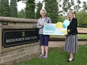 Supporting image for story: Outgoing golf club captain hands cheque to hospice