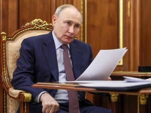 Supporting image for story: Russia says Putin will travel to China in August