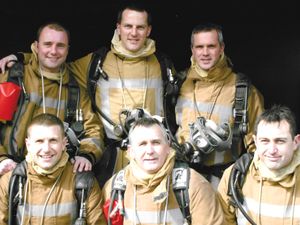 Supporting image for story: Dedicated Staffordshire firefighter to hang up helmet after three decades of service