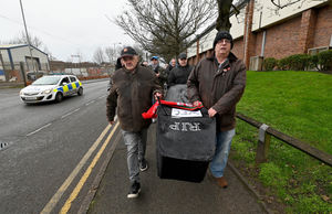 Walsall fans protest about the board at Banks's Stadium.