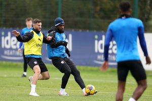 Cedric Kipre has possession of the ball under pressure from Erik Pieters (Photo by Adam Fradgley/West Bromwich Albion FC via Getty Images).