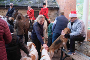 The owner of the Burton Hotel Jana Hyde and former Burton Hotel owner John Richardson make a fuss of the hounds. Image by Andy Compton