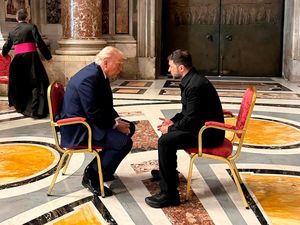 Ukraine’s President Volodymyr Zelensky, right, and President Donald Trump talk as they attend the funeral of Pope Francis in the Vatican