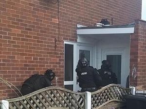 Supporting image for story: Police use saw to slice through Shrewsbury front door in drugs raid arrests