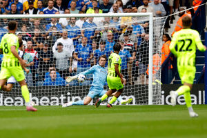 Josh Griffiths makes a big save for Albion against Portsmouth (Photo by Adam Fradgley/West Bromwich Albion FC via Getty Images)
