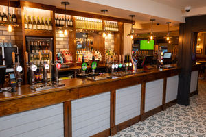 The bar area is lighter and has a large selection of drinks