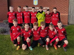 Supporting image for story: Hospice logo takes pride of place on footballers shirts as club shows support for charity