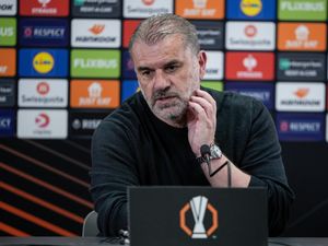 Tottenham coach Ange Postecoglou speaks at a press conference