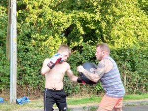 Supporting image for story: Like father, like son: Sam follows dad into boxing