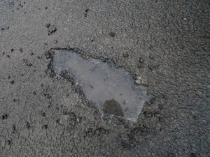 Supporting image for story: Commons committee chairman says local roads are ‘riddled with potholes’