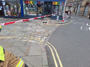 Part of a building on Bridgnorth High Street has fallen onto the pavement.