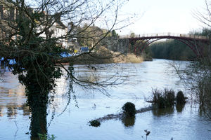 A flooded garden along the swollen River Severn in Ironbridge